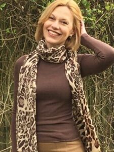 Nicola wearing leopard print scarf
